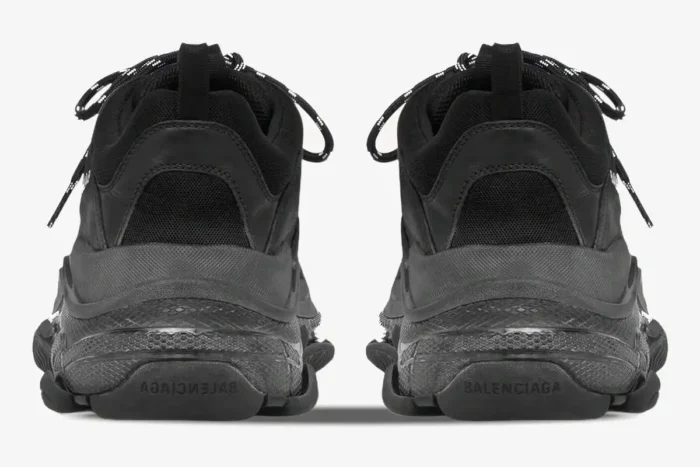 Rear view of Balenciaga Triple S black clear sole sneakers with chunky layered heels. - SKU 541624W2FB11000