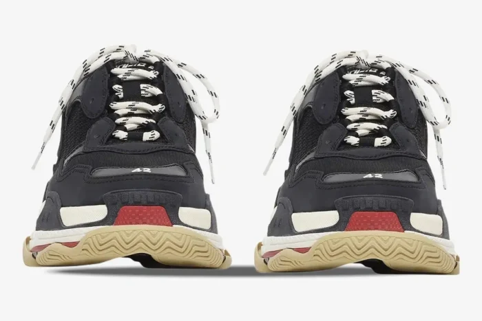 Front view of Balenciaga Triple S sneakers in black, white, and red with chunky soles and patterned laces. - SKU 533882W09OM1000