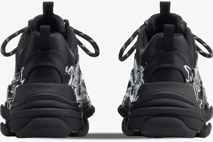 Rear view of black Balenciaga Triple S DIY Metal Artwork sneakers with chunky soles and white graphics. - SKU 536737W2FAY1090