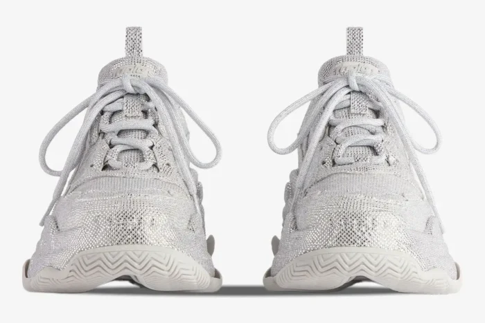 Front view of Balenciaga Triple S Rhinestone Silver White sneakers with chunky soles and tied laces. - SKU 524039W2TST1100