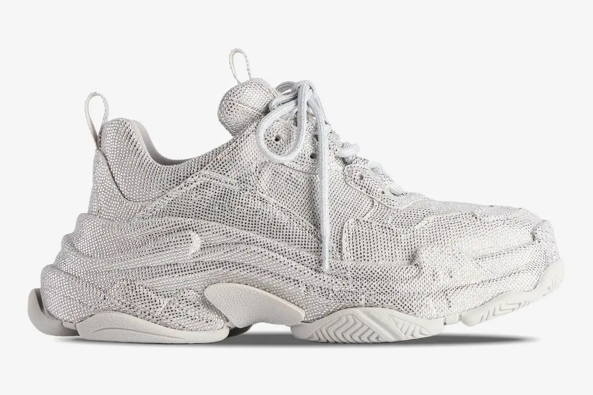 balenciaga-triple-s-rhinestone-silver-side-view-524039w2tst1100-583-349 Balenciaga Triple S Rhinestone Silver White sneaker shown from a side profile view against a white background. - SKU 524039W2TST1100