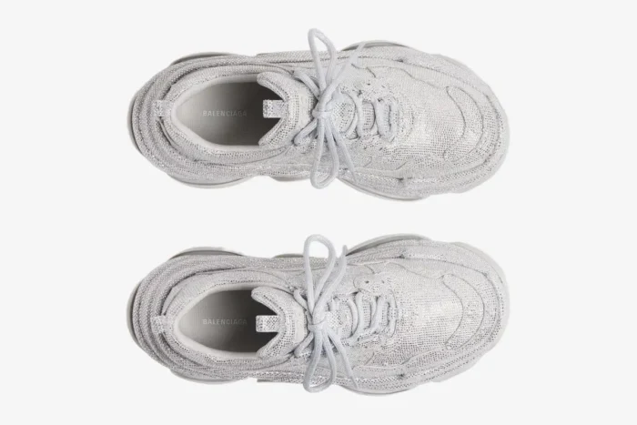 Top view of Balenciaga Triple S sneakers in silver and white, covered in sparkling rhinestones. - SKU 524039W2TST1100