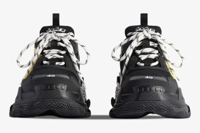 Front view of black Balenciaga Triple S Tapa Type sneakers with white patterned laces and size 40 on the toe. - SKU 536737WTRST1070