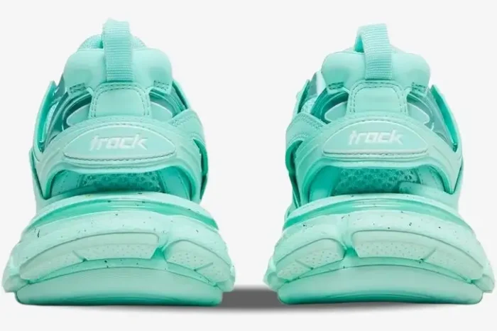 Rear view of mint green Balenciaga Wmns Track Sneakers featuring chunky soles and 'track' logo. - SKU 542436W2LA13000