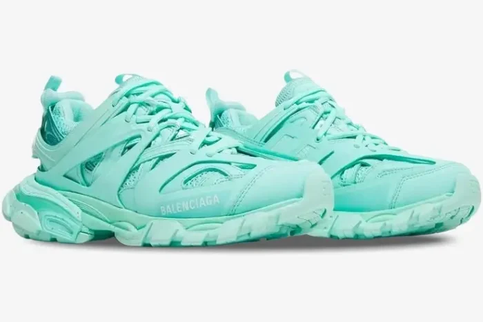 Mint green Balenciaga Women's Track sneakers shown from a three-quarter side angle against a white background. - SKU 542436W2LA13000