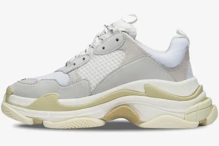 Balenciaga Women's Triple S Trainer in white and cream, side profile view. - SKU 524036W09E19000