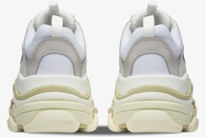 Rear view of white Balenciaga Wmns Triple S Trainers showing chunky layered soles and heel branding. - SKU 524036W09E19000