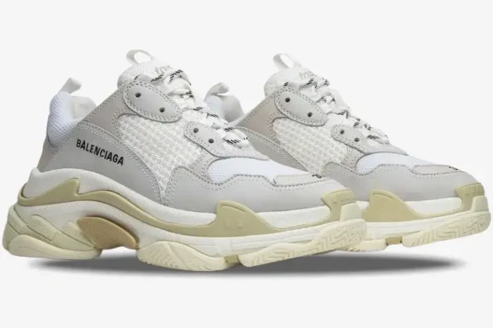 Balenciaga Women's Triple S Trainer in white, side profile view showing chunky layered soles. - SKU 524036W09E19000