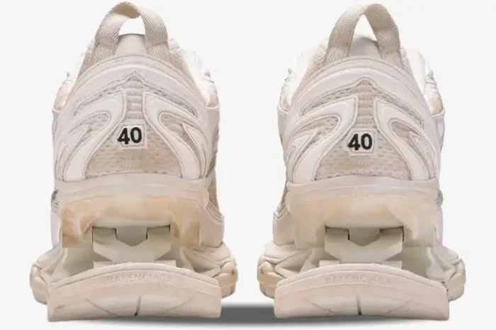 Rear view of Balenciaga X-Pander sneakers in distressed beige white with unique suspended heels. - SKU 653871W2RA29000