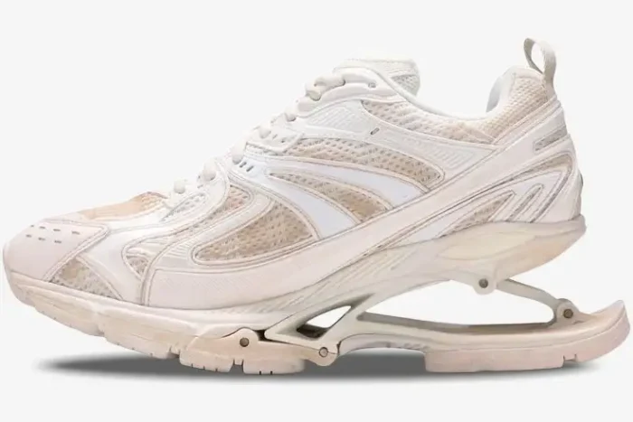 Side profile of Balenciaga X-Pander sneakers in distressed beige and white with a suspended heel. - SKU 653871W2RA29000