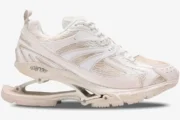 Side view of Balenciaga X-Pander sneakers in distressed beige and white with a unique suspended heel design. - SKU 653871W2RA29000