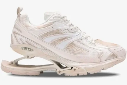 Side view of Balenciaga X-Pander sneakers in distressed beige and white with a unique suspended heel design. - SKU 653871W2RA29000