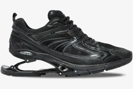 Side view of Balenciaga X-Pander Distressed Suspended Heel Sneaker in black with a mechanical heel. - SKU 653871W2RA21000