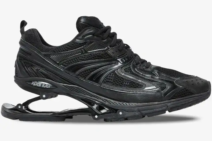 balenciaga-xpander-suspended-heel-black-side-653871w2ra21000-024-929 Side view of Balenciaga X-Pander Distressed Suspended Heel Sneaker in black with a mechanical heel. - SKU 653871W2RA21000