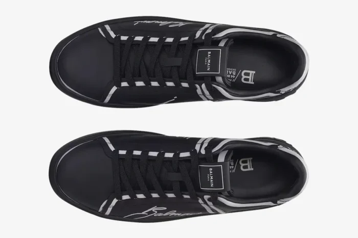 Top-down view of a pair of black Balmain B-Court printed calfskin trainers with white accents. - SKU EN1VI690LCLP