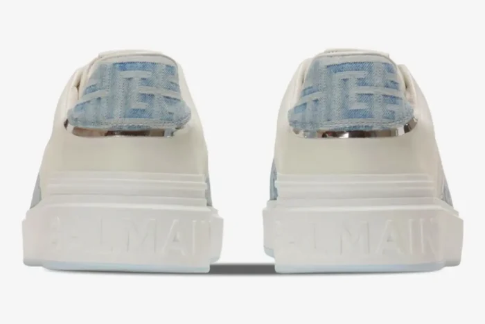 Back view of Balmain B-Court low-top sneakers in white with blue monogrammed denim heel tabs. - SKU XM1VI291LDSH