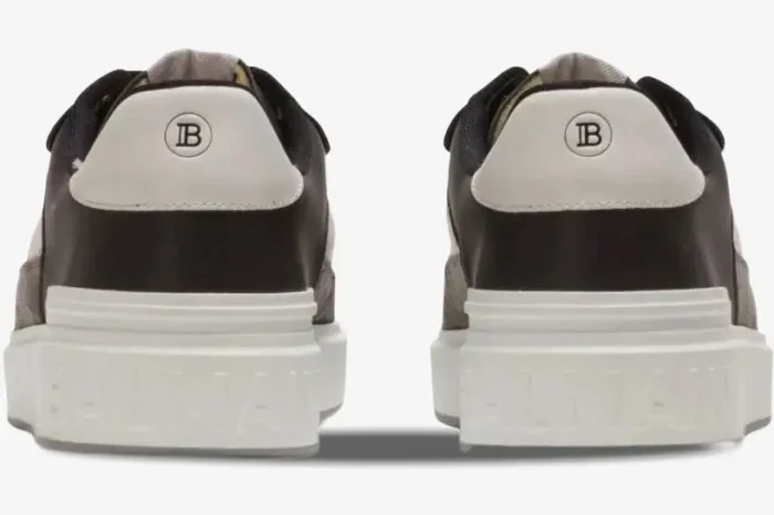 Rear view of Balmain B-Court Flip Low-Top sneakers in black, white, and grey with embossed logo on the sole. - SKU AM1VI245LSEP