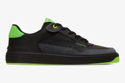 Balmain B-Court low-top sneaker in black and neon green, side profile view. - SKU AM1VI289LSYM