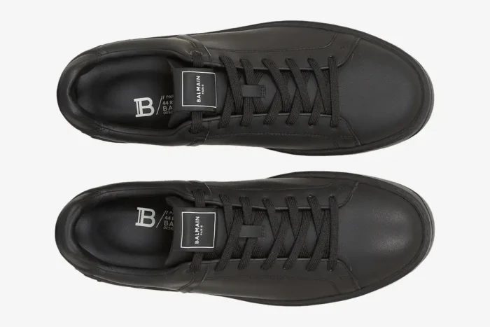 Top-down view of black Balmain B-Court calfskin trainers with matching black laces. - SKU GM1VI288LVTR