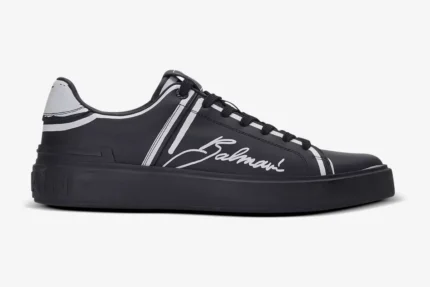 Side view of Balmain B-Court black calfskin trainers with white script logo. - SKU EN1VI690LCLP