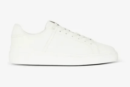 Side profile view of Balmain B-Court white calfskin leather trainers with tonal laces and thick soles. - SKU GM1VI288LVTR