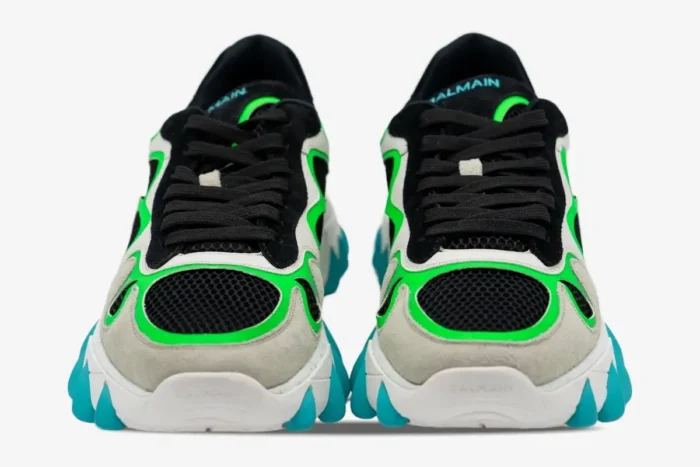 Front view of Balmain B-East sneakers in black, green, and turquoise with mesh and suede details. - SKU AM1VI327THTF