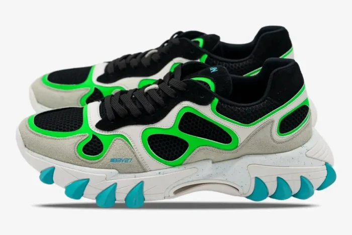 Side view of Balmain B-East sneakers in black, neon green, and turquoise with chunky soles. - SKU AM1VI327THTF