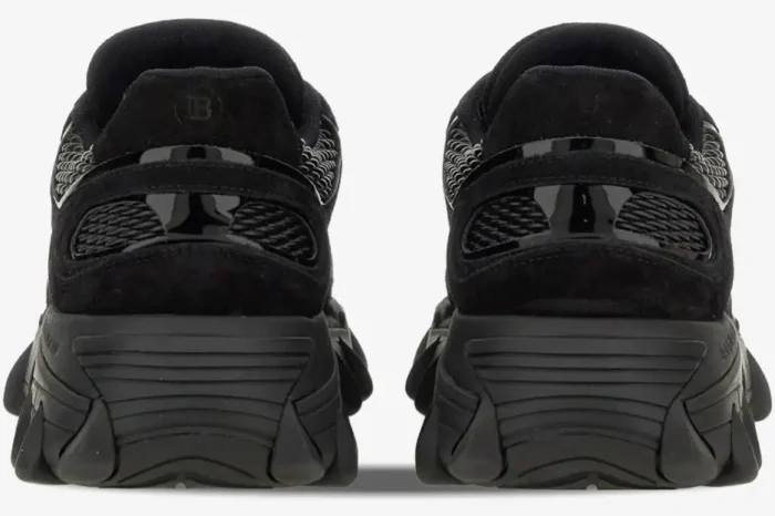 Rear view of black Balmain B-East low-top sneakers with chunky soles and suede heels. - SKU AM1VI327THPC-0PA
