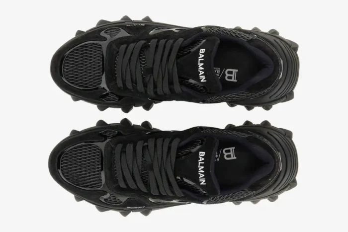 Top-down view of black Balmain B-East Low Top sneakers with chunky spiked soles. - SKU AM1VI327THPC-0PA
