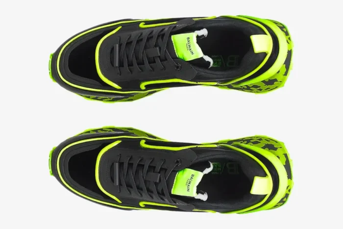 Top-down view of black Balmain B-Racer sneakers with neon yellow accents and a marbled midsole. - SKU ym1vi305tvnh