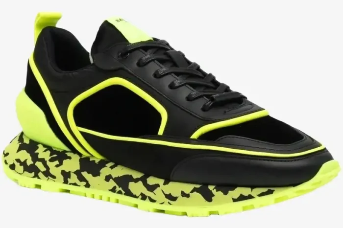 Balmain B-Racer sneaker in black and neon yellow with a marbled midsole, shown from a side perspective. - SKU ym1vi305tvnh