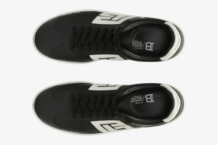 Top-down view of black and white Balmain Calfskin Swan Trainers with leather uppers and white logos. - SKU EM0VI360LVTR