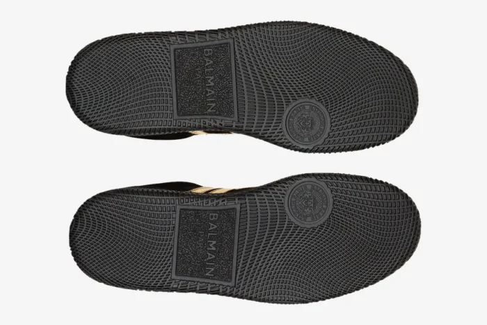 Bottom view of black rubber soles for Balmain Swan black and gold sneakers. - SKU AM1VI261LSGG