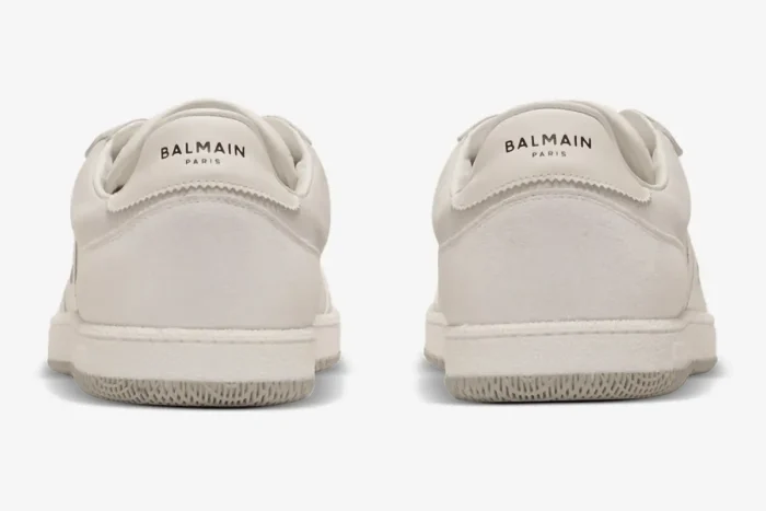 Rear view of off-white Balmain Swan suede and smooth leather trainers featuring the brand logo on the heel tabs. - SKU FM1VI360LWSC