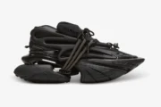 Side profile of a Balmain Unicorn chunky sneaker in all black with a futuristic sculptural design. - SKU BM1VJ309KNSC