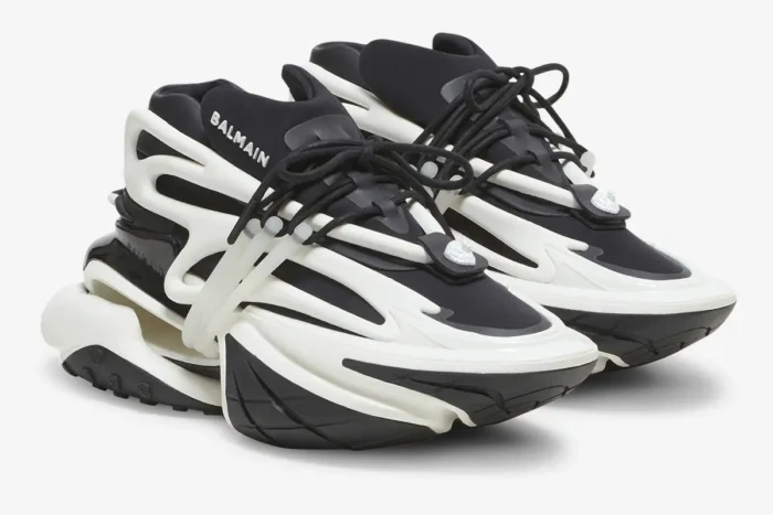Balmain Unicorn Chunky Sneakers in black and white, shown from a front three-quarter angle. - SKU BN1VF724KNOC