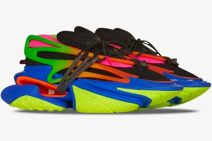 Side profile of Balmain Unicorn Low sneakers in multicolor black with neon green, pink, and blue accents. - SKU YM1VJ309KNHC