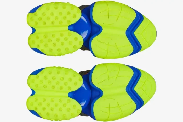 Bottom view of Balmain Unicorn Low Multicolor Black sneakers featuring neon green and blue segmented outsoles. - SKU YM1VJ309KNHC