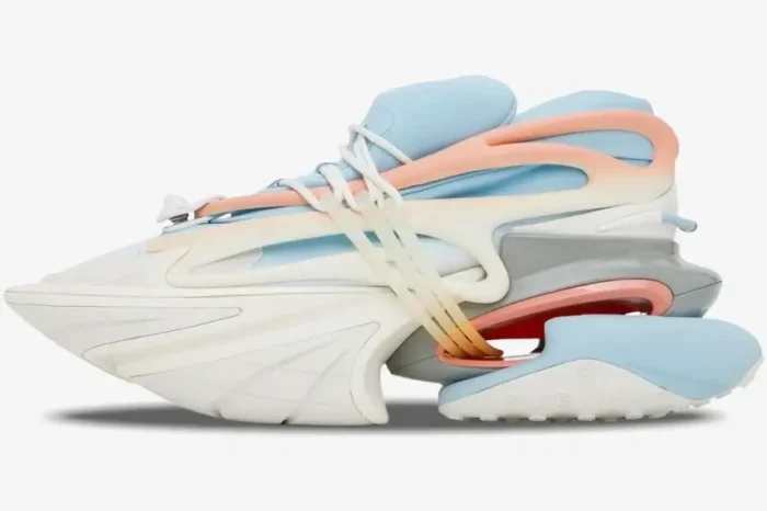 Side profile of Balmain Unicorn Low Top sneakers in light blue, pink, and white neoprene and leather. - SKU baam0vj309kncg-gmo