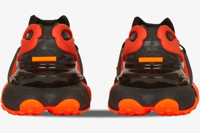 Rear view of Balmain Unicorn Low-Top sneakers in black and vibrant orange. - SKU YM1VJ309KNCA