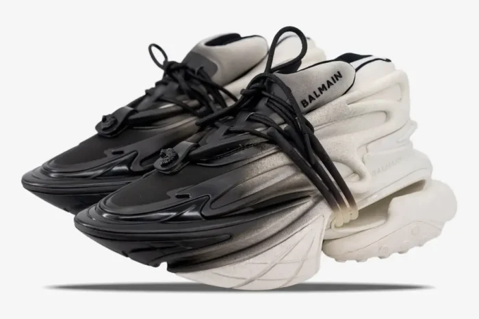 Balmain Unicorn Low Top sneakers in white and black gradient, three-quarter side view. - SKU YM0VJ309KNED-GAB