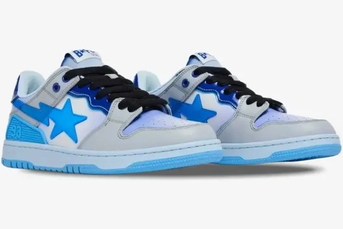 A Bathing Ape Sk8 Sta M1 sneakers in blue and grey, three-quarter side view on a white background. - SKU 1I30191003-BLU