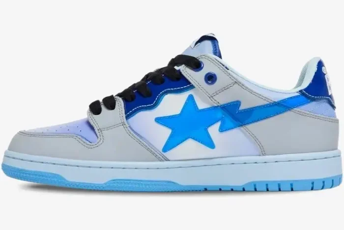 A Bathing Ape Sk8 Sta M1 'Blue' sneaker in a side profile view with grey and blue panels. - SKU 1I30191003-BLU