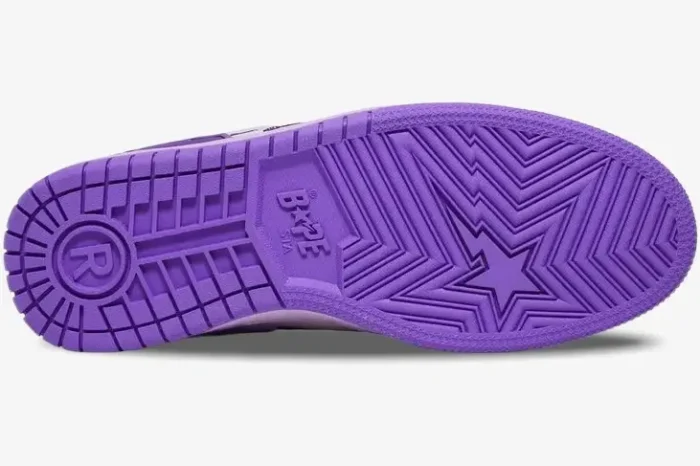 Bottom view of the purple A Bathing Ape Sk8 Sta M1 sneaker outsole featuring a star pattern and logo. - SKU 1I30191003-PUR