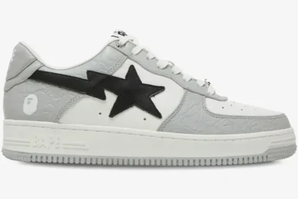 A Bathing Ape Bape Sta sneaker in white and grey embossed camo, side profile view with black star logo. - SKU 1H70191002-WHT
