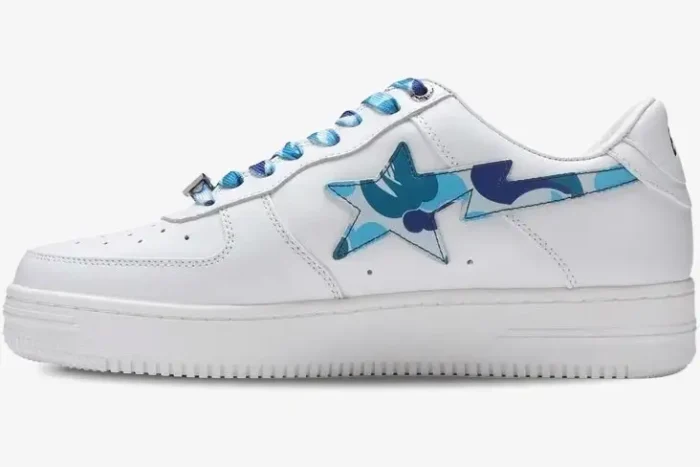 Side profile of a white A Bathing Ape BAPE STA sneaker with a blue ABC camo star logo and matching laces. - SKU 1H20191045-BLU
