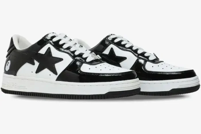 A pair of A Bathing Ape Bape Sta Low sneakers in black and white patent leather, side profile view. - SKU 1H70191001-BLK