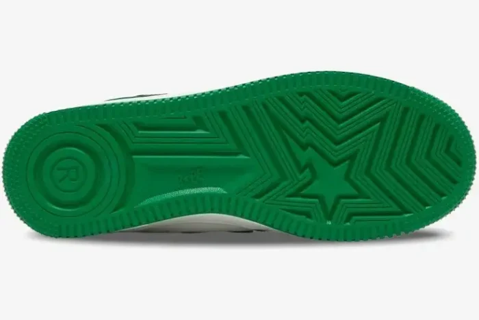 Bottom view of a green Bape Sta Low patent leather sneaker showing the detailed star logo outsole. - SKU 1H70191001-GRA