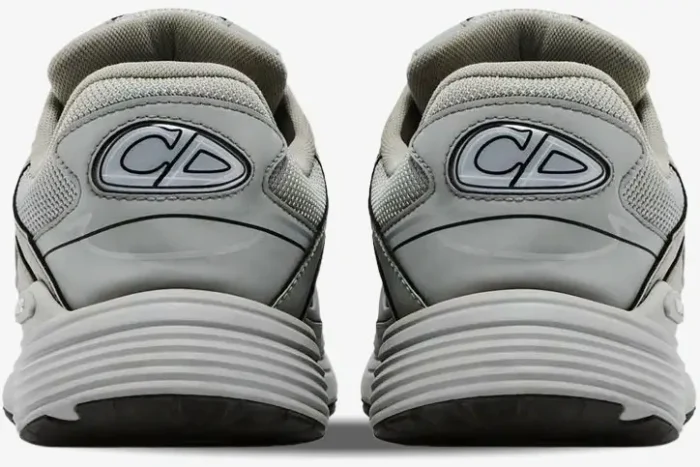 Rear view of grey Christian Dior B30 sneakers featuring the CD logo and ribbed soles. - SKU 3SN279ZRD_H868