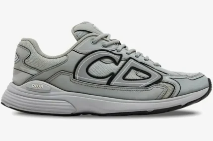Side profile of a Christian Dior B30 sneaker in grey mesh and technical fabric with a large CD logo. - SKU 3SN279ZRD_H868
